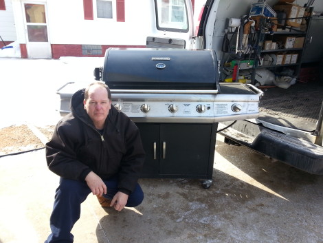 Mike Davis of Portage donating his grill to the Portage family skate park project on 3/1/15